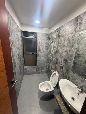 Bathroom in 2 BHK Apartment at Paradise Lifespaces Sai World City, New Panvel – for Rent