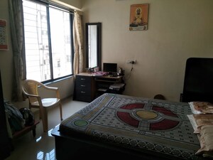 Bedroom in 2 BHK Apartment at Vyas Ranjeet, Kothrud – for Rent