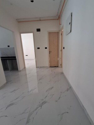 Building Lobby in 2 BHK Apartment at Ruparel Sky Green, Kandivali West – for Rent