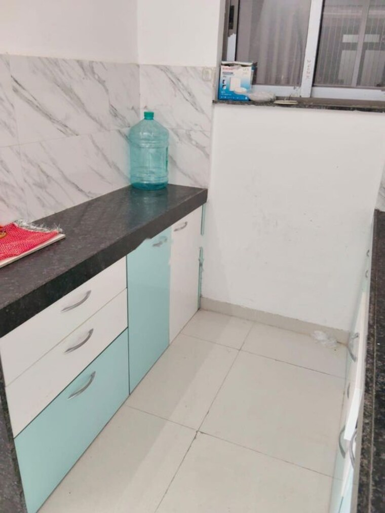 Kitchen, uk-iridium-tower-2 1 Bedroom 610 Sq.Ft. Apartment In Kandivali East Mumbai 10642092