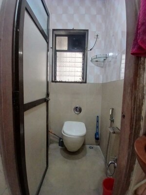 Bathroom in 1 BHK Apartment at Sai Aasha Daya CHS Ltd., Mulund East – for Rent