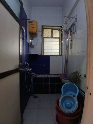 Bathroom in 1 BHK Apartment at Sai Aasha Daya CHS Ltd., Mulund East – for Rent