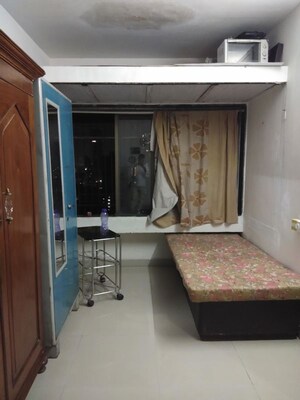 Living Room in 1 BHK Apartment at Mahalaxmi CHS Worli, Worli – for Rent