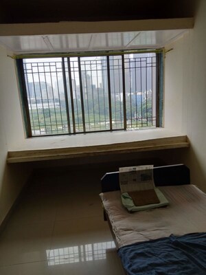 Living Room in 1 BHK Apartment at Mahalaxmi CHS Worli, Worli – for Rent