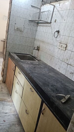 Kitchen in 1.5 BHK Apartment at Oshiwara – for Rent