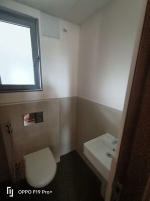 Bathroom in 1 BHK Apartment at Piramal Vaikunth, Balkum Pada – for Rent