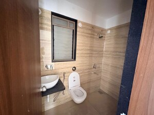 Bathroom in 2.5 BHK Apartment at Raga Top Towers, Wakad – for Rent