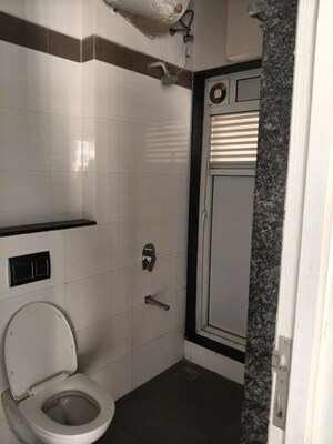 Bathroom in 2 BHK Apartment at Rustomjee Azziano Wing D, Thane West – for Rent