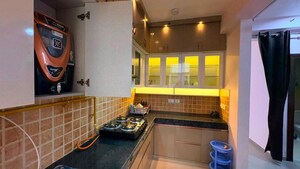 Kitchen in 2.5 BHK Apartment at Mahagun Mywoods, Sector 16c Greater Noida – for Rent