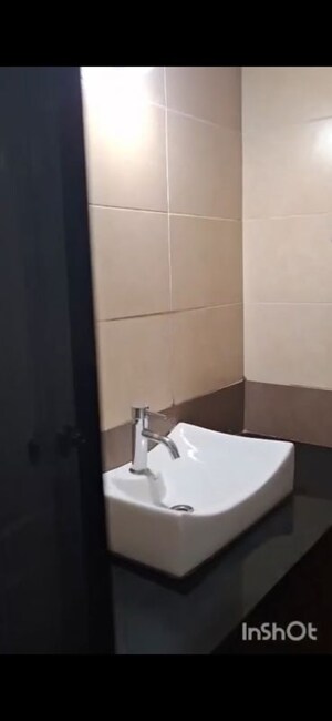 Bathroom in 3 BHK Apartment at Mind Space Queenstown, Chinchwad – for Rent