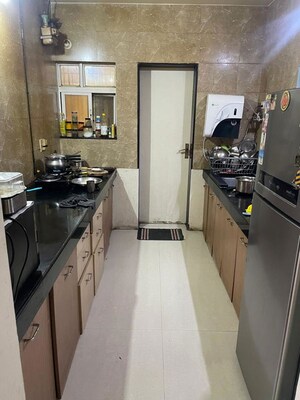 Kitchen in 2 BHK Apartment at Palash FGH, Wakad – for Rent