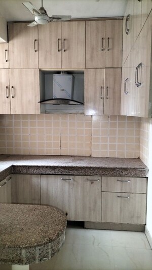 Kitchen in 2.5 BHK Apartment at SRS Royal Hills, Sector 87 – for Rent
