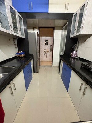 Kitchen in 2 BHK Apartment at Alica Nagar CHS, Kandivali East – for Sale