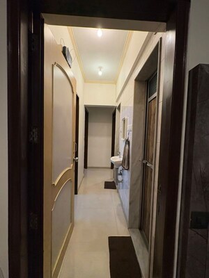 Building Lobby in 2 BHK Apartment at Alica Nagar CHS, Kandivali East – for Sale