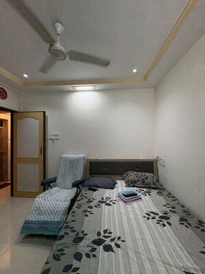 Bedroom in 2 BHK Apartment at Alica Nagar CHS, Kandivali East – for Sale