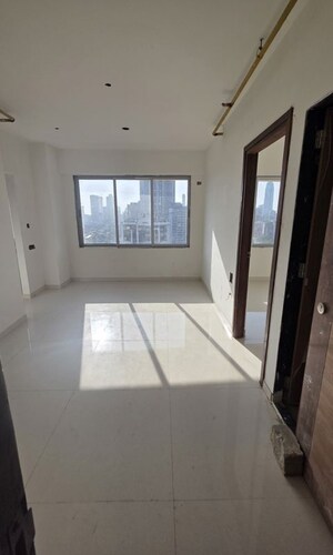 Living Room in 2 BHK Apartment at Livstone Viva, Agripada – for Sale