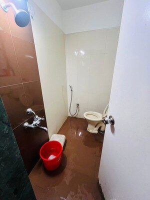 Bathroom in 2.5 BHK Apartment at Dahanukar Colony – for Rent