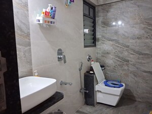Bathroom in 2 BHK Apartment at Ten United Athashri, Dhanori – for Rent