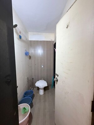 Bathroom in 2 BHK Apartment at Nisarg Hyde Park, Kharghar – for Rent