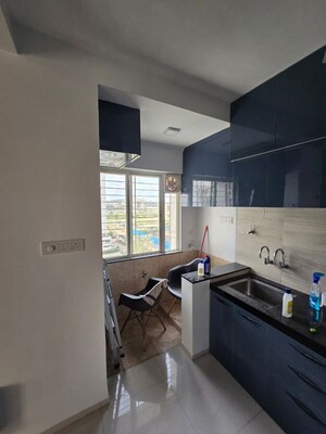 Kitchen in 2 BHK Apartment at Kunal Iconia, Mamurdi – for Rent