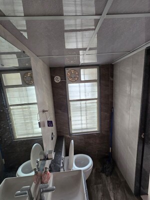 Bathroom in 2 BHK Apartment at Kunal Iconia, Mamurdi – for Rent
