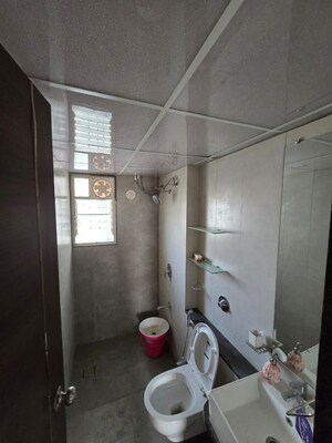 Bathroom in 2 BHK Apartment at Kunal Iconia, Mamurdi – for Rent
