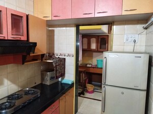Kitchen in 2.5 BHK Apartment at Vijay Garden, Ghodbunder Road – for Rent