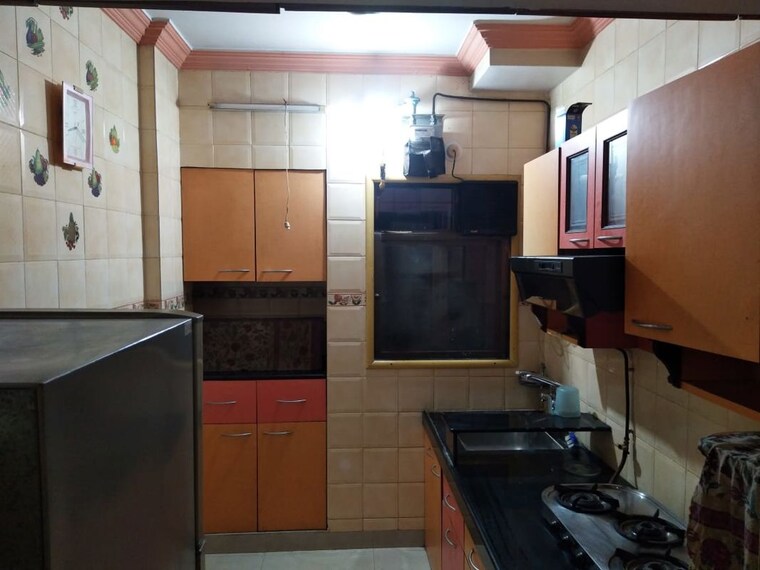 Kitchen, vijay-garden 2.5 Bedroom 900 Sq.Ft. Apartment In Ghodbunder Road Thane 10642683