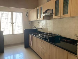 Kitchen in 2 BHK Apartment at Naiknavare Mystique Mood, Viman Nagar – for Rent