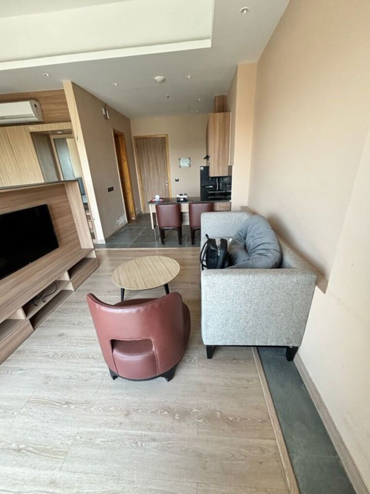 Living Room, paras-square-service-apartments Studio 870 Sq.Ft. Apartment In Sector 63a Gurgaon 10642753