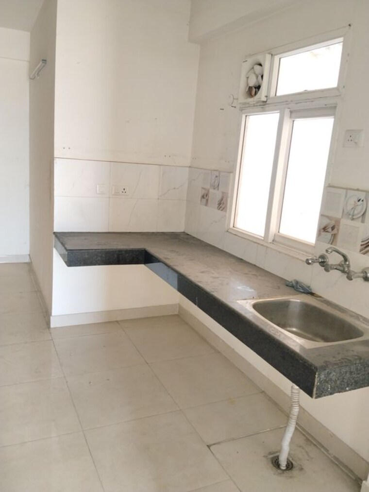Kitchen, signature-global-the-roselia 2 Bedroom 569 Sq.Ft. Apartment In Sector 95a Gurgaon 10642787