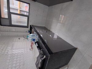 Kitchen in 1 BHK Apartment at Unique Shanti The Sky Line, Mira Road – for Rent