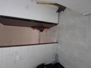 Kitchen in 1 BHK Apartment at Unique Shanti The Sky Line, Mira Road – for Rent