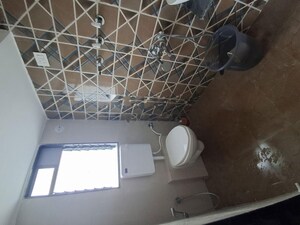 Bathroom in 1 BHK Apartment at Unique Shanti The Sky Line, Mira Road – for Rent