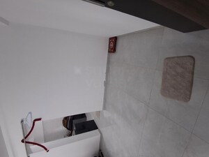 Bathroom in 1 BHK Apartment at Unique Shanti The Sky Line, Mira Road – for Rent