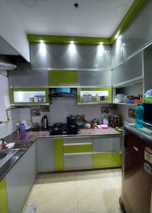 Kitchen in 2 BHK Apartment at Gaur City 2 - 14th Avenue, Sector 16c Greater Noida – for Rent