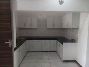 Kitchen in 3 BHK Builder Floor at Dhakoli – for Sale