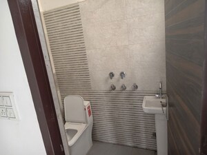 Bathroom in 3 BHK Builder Floor at Dhakoli – for Sale