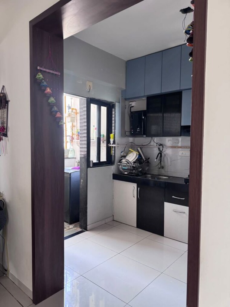 Kitchen, dev-aurum 2 Bedroom 1400 Sq.Ft. Apartment In Prahlad Nagar Ahmedabad 10630265