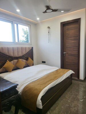Bedroom in 3 BHK Builder Floor at Udyog Vihar Phase 2 – for Rent