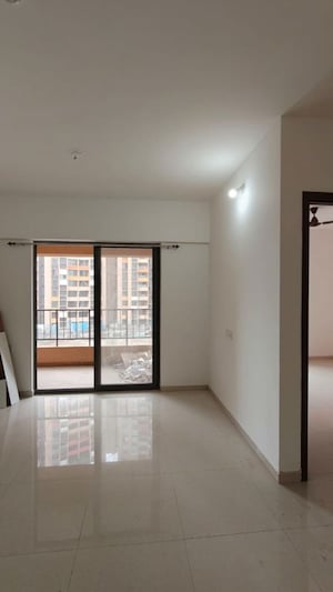 Living Room in 2 BHK Apartment at Shapoorji Pallonji Joyville Hadapsar Annexe, Hadapsar – for Rent