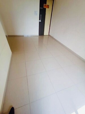 Living Room in 2 BHK Apartment at Nisarg Hyde Park, Kharghar – for Rent