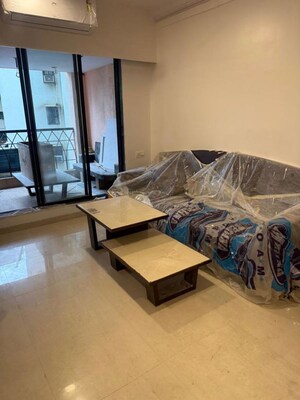 Living Room in 2 BHK Apartment at Globe Heights, Goregaon East – for Rent