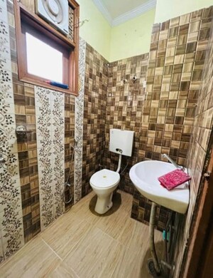 Bathroom in 2 BHK Builder Floor at Freedom Fighters Enclave – for Rent