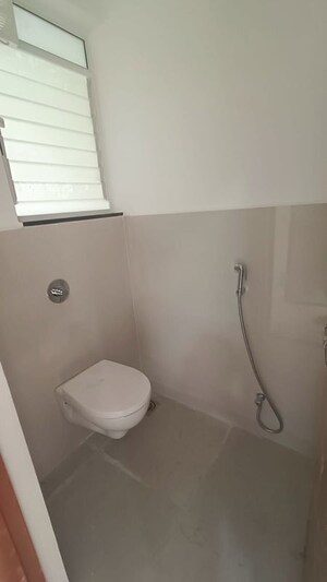 Bathroom in 1 BHK Apartment at Raga Top Towers, Wakad – for Rent
