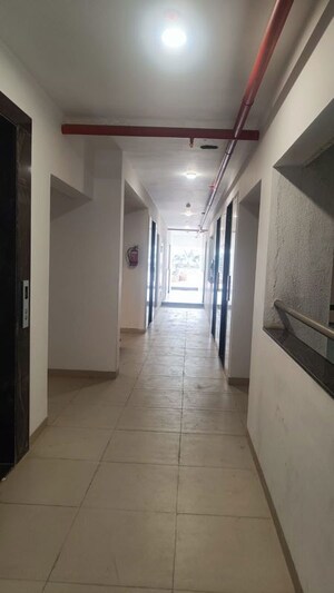 Building Lobby in 1 BHK Apartment at Raga Top Towers, Wakad – for Rent
