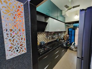 Kitchen in 2 BHK Apartment at Progressive Group Signature, Ghansoli – for Rent