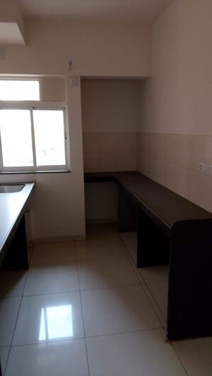 Kitchen in 2 BHK Apartment at Godrej Nirvaan, Themghar – for Sale