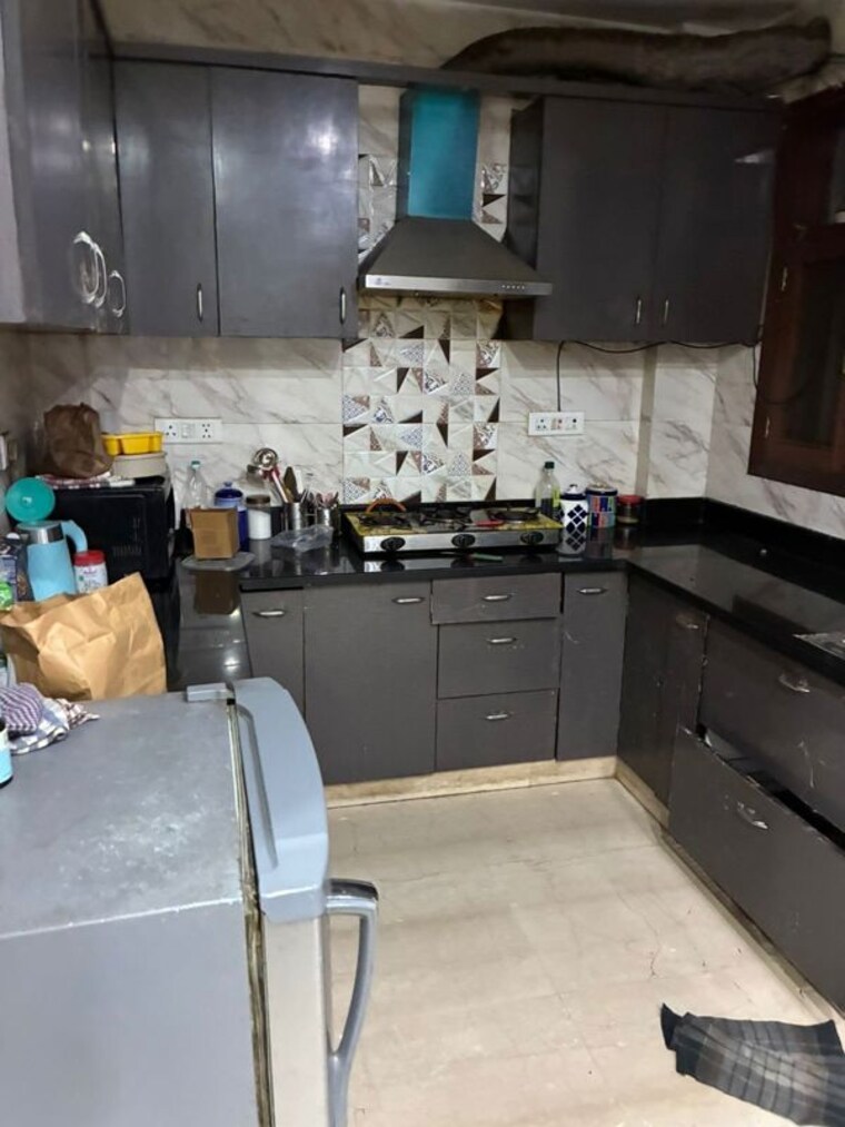 Kitchen, rajouri garden 4 Bedroom 320 Sq.Yd. Builder Floor In Rajouri Garden Delhi 10643071