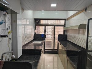 Kitchen in 2 BHK Apartment at Paradise Sai World City Phase 2, New Panvel – for Rent